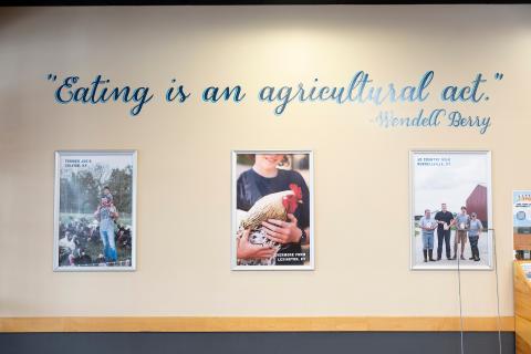 "Eating is an agricultural act" quote on a wall